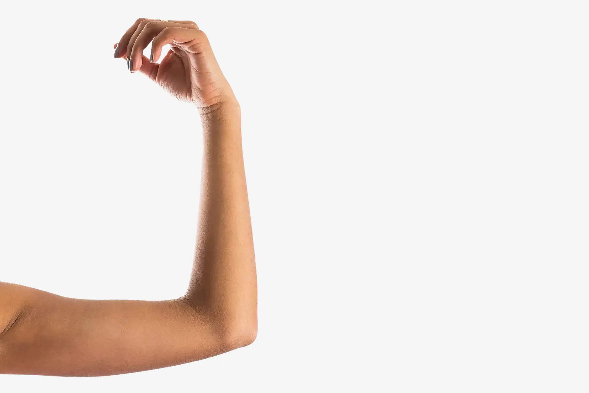 Gebeugter Arm einer Frau | Tennisarm