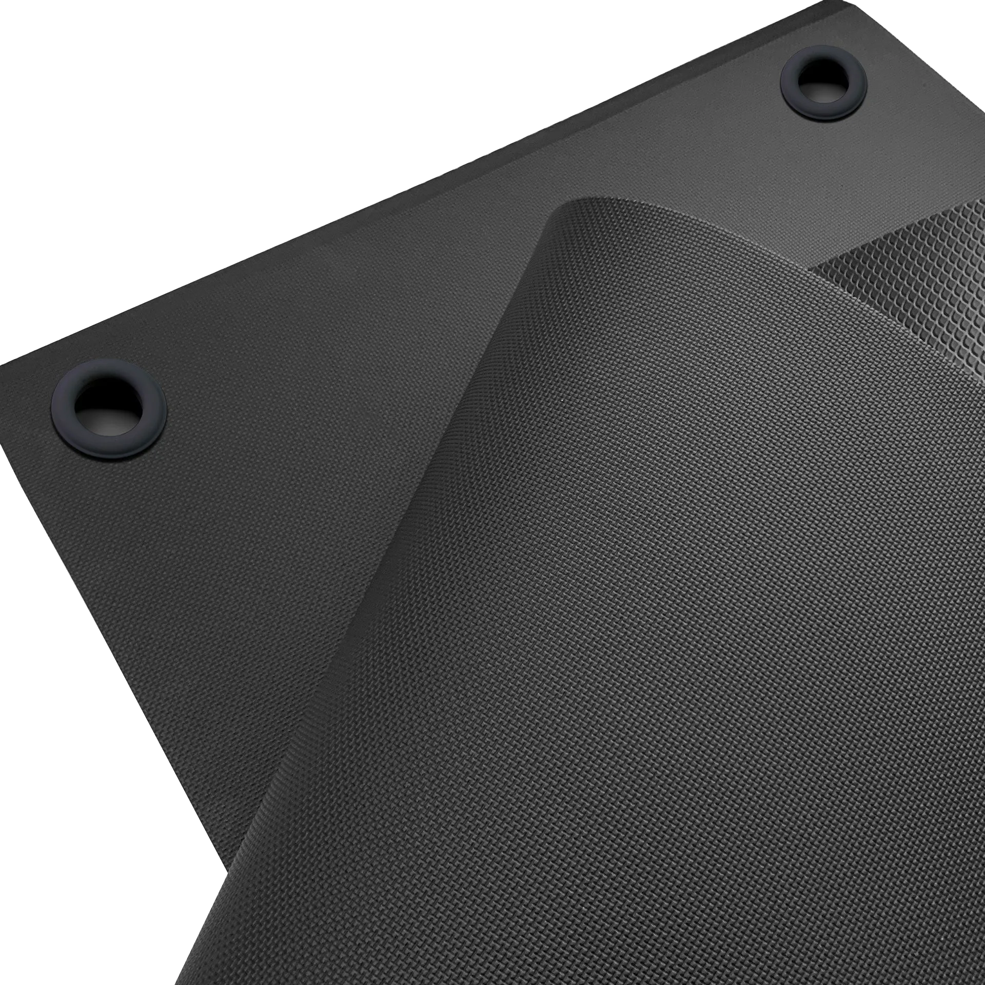 Nahaufnahme einer schwarzen Gymnastikmatte der Marke ARTZT thepro mit fein strukturierter, rutschfester Oberfläche; die integrierten Metallösen an der Kante sind sichtbar und ermöglichen eine sichere Aufhängung der Matte. #stil_mit ösen